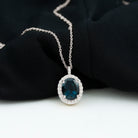 3 CT Oval Cut London Blue Topaz and Diamond Halo Pendant London Blue Topaz - ( AAA ) - Quality - Rosec Jewels